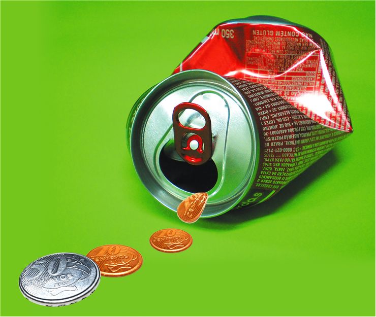 Picture Of Can Of Soft Drink And Coins